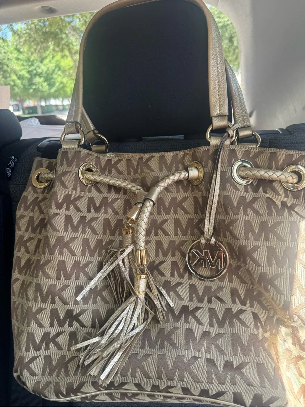 Michael Kors Brown MK Monogram Drawstring Tote with Tassel